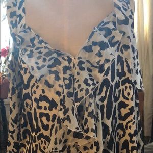 Leopard print silk blouse . Cold shoulders ,